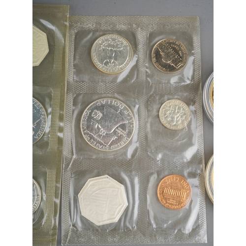 323 - A small quantity of USA coins,  including two five coin with token set of 1961 Philadelphia Mint, an... 