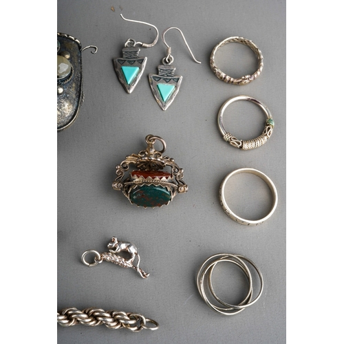 324 - Collection of silver jewellery to include agate set swivel fob, silver rings, silver chains, Indian ... 