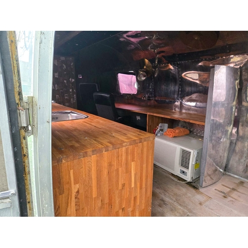 329 - A 1976 Airstream Manitoba travel trailer,
serial number and original plaques present on outside of i... 