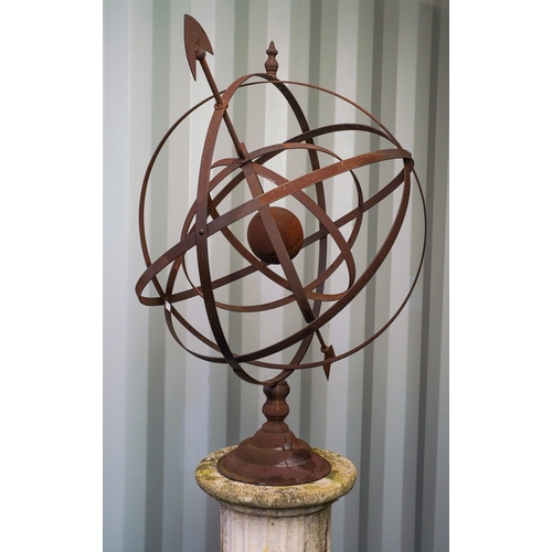 465 - A reproduction lightweight metal garden armillary in rusted condition, on a reconstituted concrete f... 