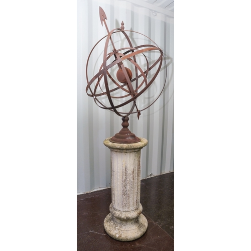 465 - A reproduction lightweight metal garden armillary in rusted condition, on a reconstituted concrete f... 