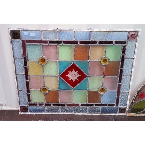 466 - Two late Victorian / Edwardian leaded coloured glass window panels, one of arch shape, 84cm x 40cm, ... 