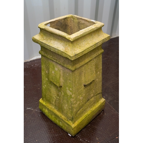 469 - A chimney pot of tapered square form, vents to each side, height 66cm