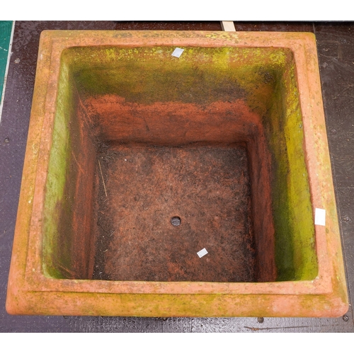 472 - A terracotta planter of square form, moulded top rim, height 53cm x width 52cm