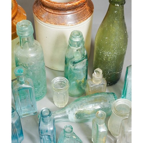 474 - Collection of antique glass bottles and 2 stone ware jars ( 1 box)