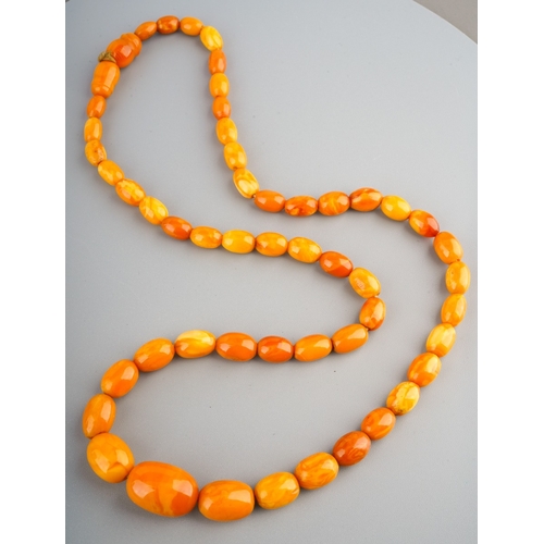 763 - A set of amber butterscotch beads, total length 26.5g, gross weight 20g