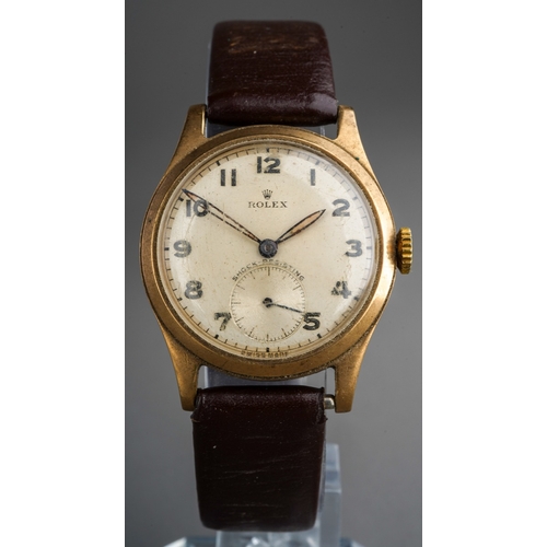 775 - 9 ct gold men's vintage Rolex wristwatch on a brown leather strap, gross weight ( without strap)29g