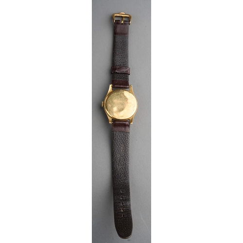 775 - 9 ct gold men's vintage Rolex wristwatch on a brown leather strap, gross weight ( without strap)29g