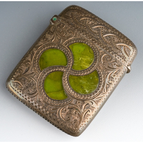 863 - An Edwardian silver and agate vesta case, the front profusely engraved with Celtic knot and swirling... 