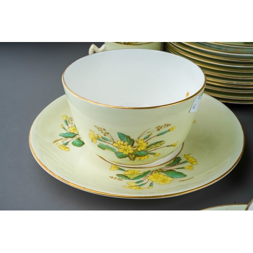 884 - An English bone china early 20th Century Primrose pattern breakfast service, pattern no 6641 to incl... 