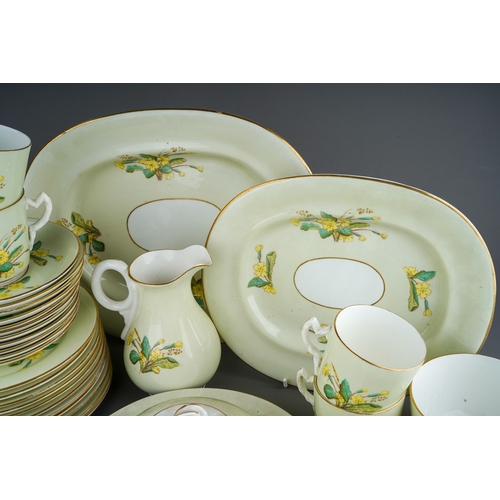 884 - An English bone china early 20th Century Primrose pattern breakfast service, pattern no 6641 to incl... 