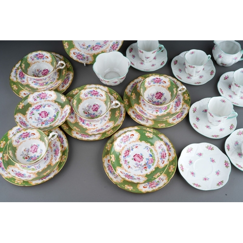 885 - A Shelley part Rosebud 13426 coffee service to include: five coffee cans, six saucers, a milk jug an... 