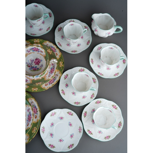 885 - A Shelley part Rosebud 13426 coffee service to include: five coffee cans, six saucers, a milk jug an... 