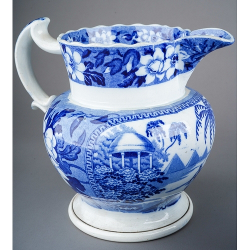 890 - An English, circa 1790, blue and white transfer printed tea bowl decorated with attendants with larg... 