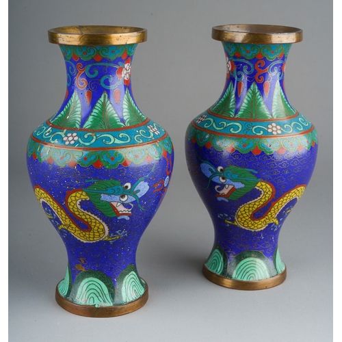 899 - A pair of Japanese Cloissonne vases decorated with five claw dragons (2)