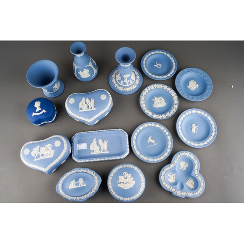 1073 - A collection 20th Century Neo-Classical style Wedgwood blue jasparware to include: a pair of heart s... 