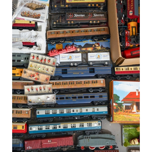 1104 - Assorted loose model railway rolling stock, carriages and locomotives together with diorama coal yar... 