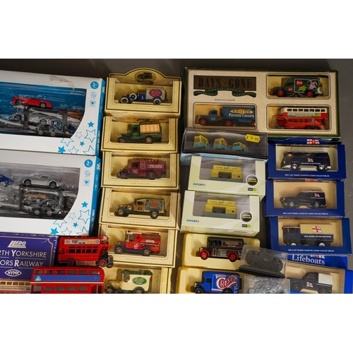 1105 - Assorted boxed die cast model cars including Classic vans, Days Gone, North Yorkshire Moors Railway ... 