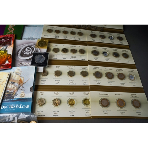 1111 - Coins, a box of Queen Elizabeth II commemorative and other coinage including thirty one current issu... 