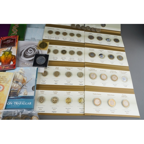 1111 - Coins, a box of Queen Elizabeth II commemorative and other coinage including thirty one current issu... 