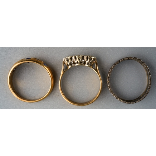 1130 - Two 9 ct gold rings, one set with diamonds in illusion setting together with a silver ring. Gross we... 