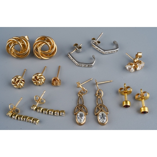 1131 - A collection of yellow and white metal earrings, to include a pair of cubic zirconia white metal ear... 