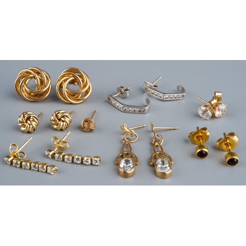 1131 - A collection of yellow and white metal earrings, to include a pair of cubic zirconia white metal ear... 