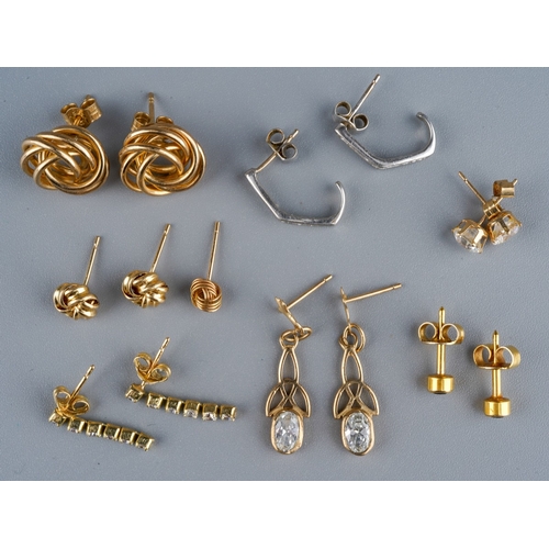 1131 - A collection of yellow and white metal earrings, to include a pair of cubic zirconia white metal ear... 