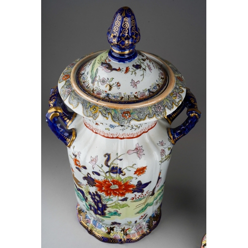 9 - A pair of 19th century Masons Ironstone twin handled jars and covers, the domed covers with octagona... 