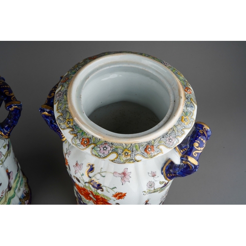 9 - A pair of 19th century Masons Ironstone twin handled jars and covers, the domed covers with octagona... 