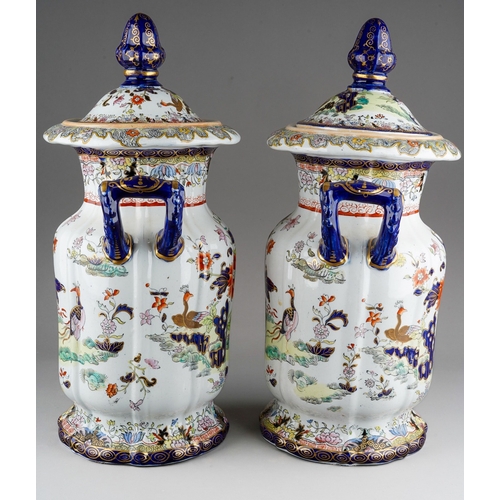 9 - A pair of 19th century Masons Ironstone twin handled jars and covers, the domed covers with octagona... 