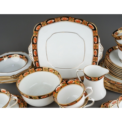 11 - A Royal Albert Crown China Imari palette tea and fruit set, comprising bread and butter plate, milk ... 