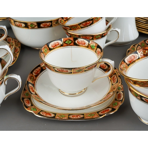 11 - A Royal Albert Crown China Imari palette tea and fruit set, comprising bread and butter plate, milk ... 