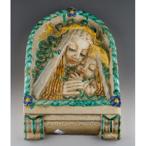 19 - A continental pottery  Madonna and child plaque  circa 1910, in the Vienna Werkstatte manner, marked... 