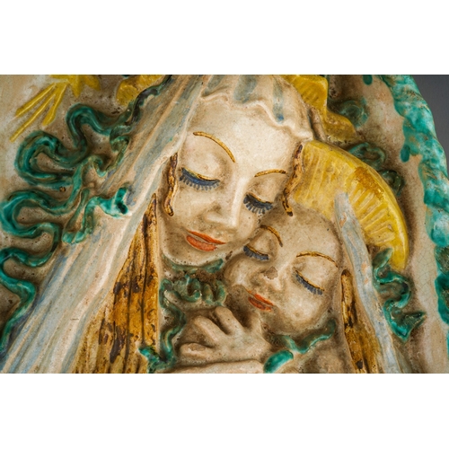 19 - A continental pottery  Madonna and child plaque  circa 1910, in the Vienna Werkstatte manner, marked... 