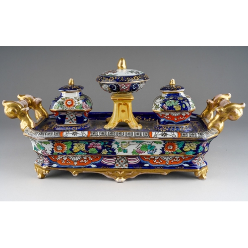 23 - An early 19th Century, circa 1830, Mason`s Ironstone China Imari large inkstand, the rectangular bod... 