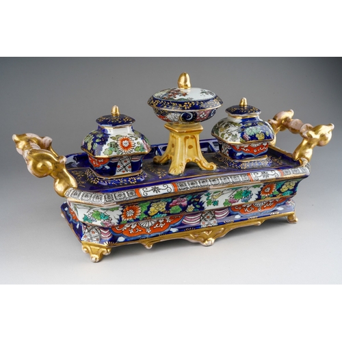 23 - An early 19th Century, circa 1830, Mason`s Ironstone China Imari large inkstand, the rectangular bod... 