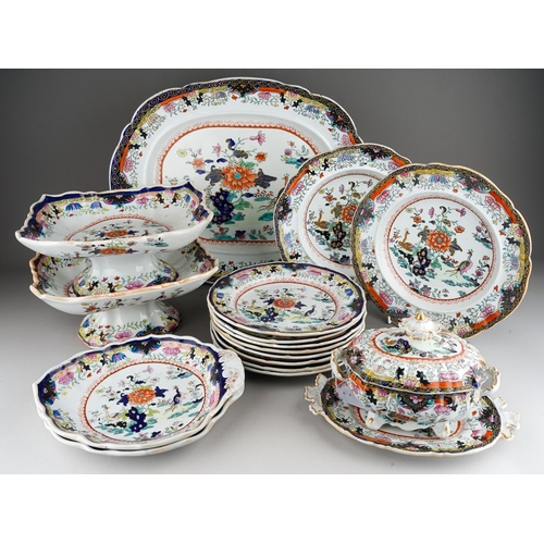 24 - A Mason`s Patent Ironstone China part Imari dinner service,  the central section with exotic birds a... 