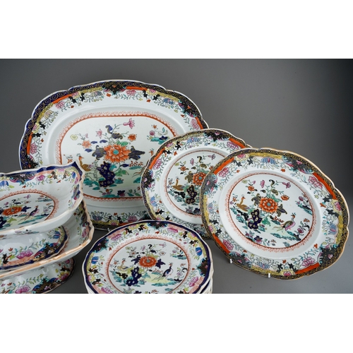 24 - A Mason`s Patent Ironstone China part Imari dinner service,  the central section with exotic birds a... 