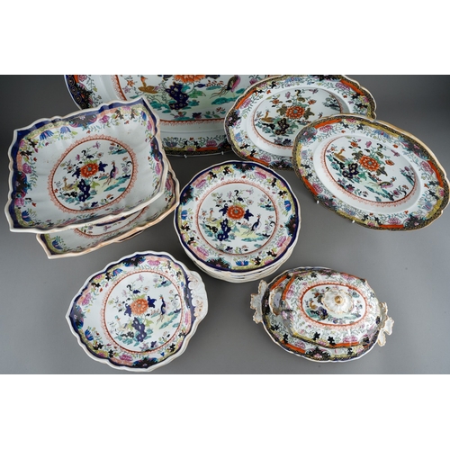 24 - A Mason`s Patent Ironstone China part Imari dinner service,  the central section with exotic birds a... 