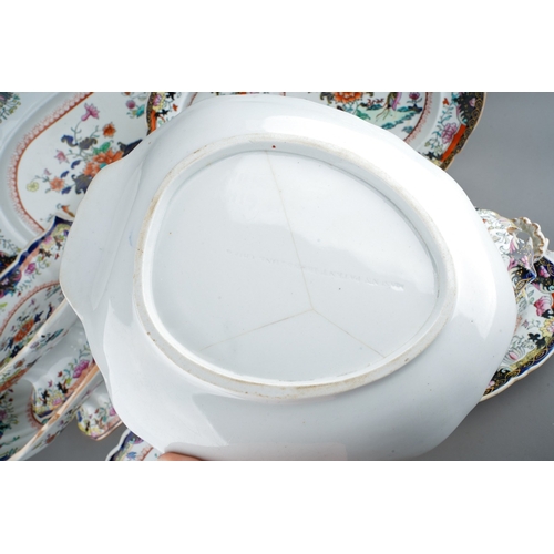 24 - A Mason`s Patent Ironstone China part Imari dinner service,  the central section with exotic birds a... 