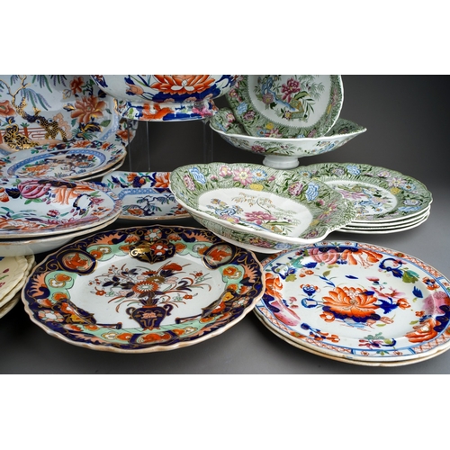 27 - A Mason`s Ironstone Imari punch bowl and three various Imari plates, two impressed marks, one with f... 