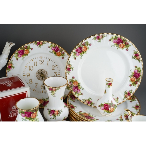 33 - Collection of Royal Albert Country Roses pattern tea wares, dinner wares etc to include large tea po... 