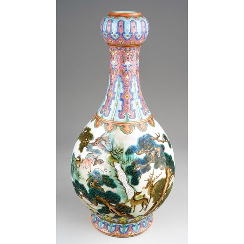 Chinese porcelain 'deer and crane' vase decorated in famille rose / verte pallet , glazed turquoise base baring Qianlong mark, shoulder decorated with ruyi head band below stiff leaf band. Approx 28 cm tall