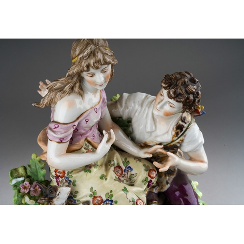 43 - A German porcelain figure group, Shepherd and Shepherdess, approximately 19cm tall, in excellent con... 