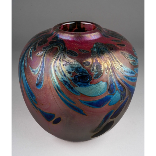 50 - Peter Layton (b.1937) an Art Glass iridescent blush, gilt and blue vase, swirling leaf design to upp... 