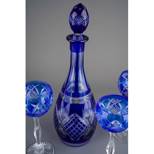 62 - Blue glass decanter with 5 matching wine glasses