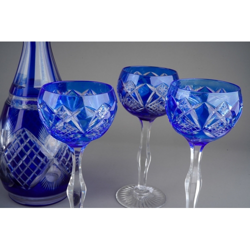 62 - Blue glass decanter with 5 matching wine glasses