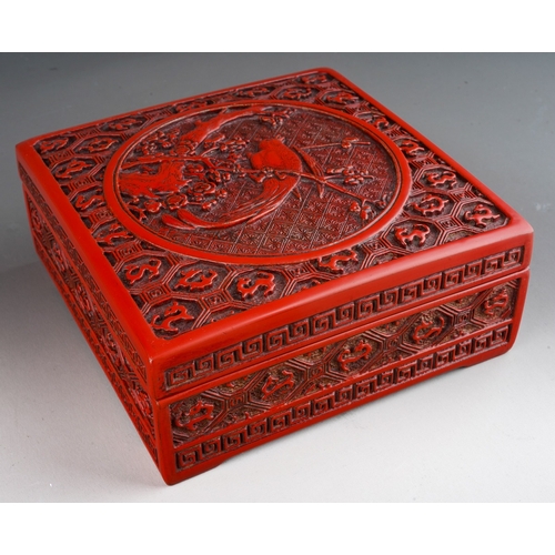 68 - A Chinese cinnabar lacquer square box, the cover carved with bird, flowers and dragons, approx. 17 c... 