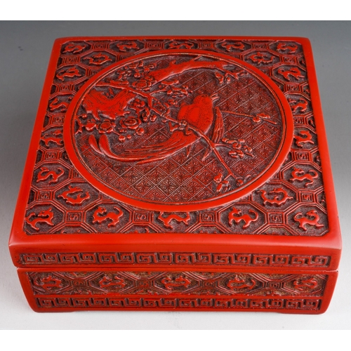 68 - A Chinese cinnabar lacquer square box, the cover carved with bird, flowers and dragons, approx. 17 c... 